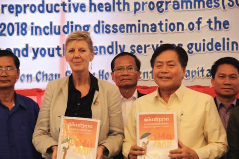 (Front left) Ms. Frederika Meijer, UNFPA Laos Representative and next to her is Minister of Health, Dr. Bounkong Syhavong holding NAYFS Guideline Book