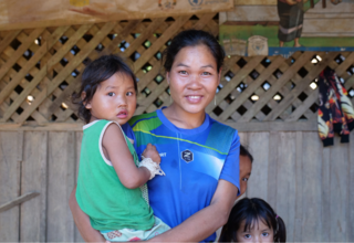 Mother and daughters in Phou Aom village, Namor, Oudomxay/UNFPA Laos